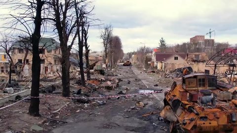 Bucha, Kyiv, Ukraine - 04.04.2022: 
Bombed city in Ukraine. Bucha after the bombing. Blown up tanks.