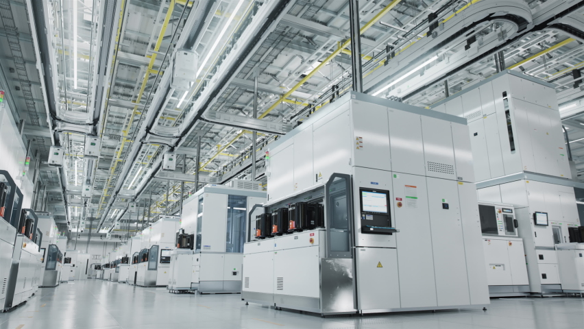 Dolly Shot Inside Bright Advanced Semiconductor Production Fab Cleanroom with Working Overhead Wafer Transfer System  | Shutterstock HD Video #1089200149