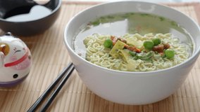 Close-up of bowl with Instant noodle traditional asian food Ramen soup, video 4k resolution