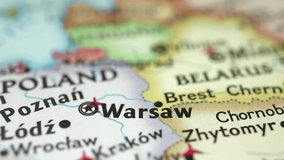 Location Warsaw in Poland, push pin on map close-up, marker of destination for travel, tourism and trip concept, Europe