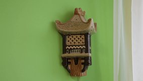 Oriental style night wall sconce lamp, turn on and off. Video is looped.
