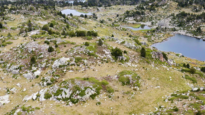 Alpine lagoon in the Pessons natural park, in the Pyrenees and Andorra.