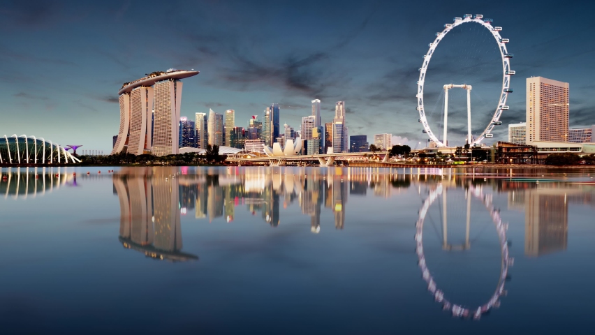 Time lapse of Singapore sunset city skyline at business district, Marina Bay