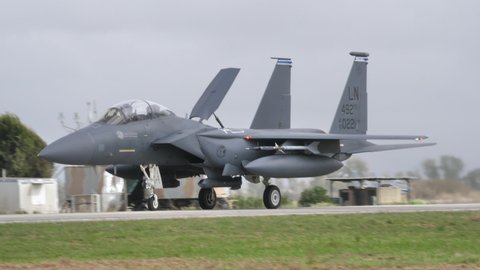 Andravida Greece APRIL, 1, 2022 American US modern supersonic bombing warplane taxiing on the runway. McDonnell Douglas Boeing F-15E Strike Eagle fighter jet airplane of United States Air Force USAF