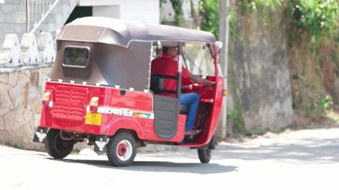 Galle, Sri Lanka - March 02 2022: Tuktuk which is also known as rickshaw on Sri Lanka roads