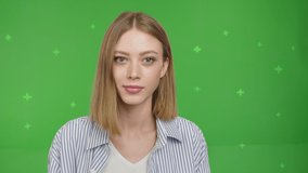 Happy pretty caucasian girl smiling face and talking to webcam make video call at home talking chatting by virtual video call zoom app online videocall meeting on green screen background. Chroma key
