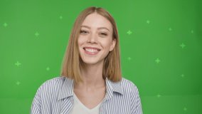 Happy pretty caucasian girl smiling face and talking to webcam make video call at home talking chatting by virtual video call zoom app online videocall meeting on green screen background. Chroma key