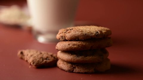 pick up biscuit,mlik glass,breakfast chocolate biscuit cookie	
