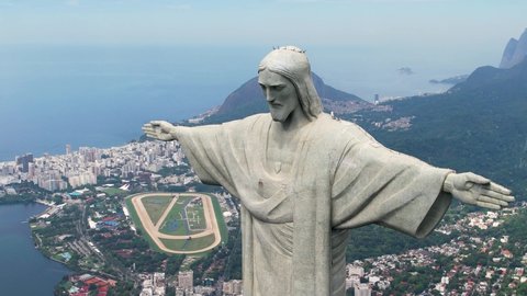 Rio de Janeiro, Rio de Janeiro, Brazil - 04.01.2022 - Panoramic view of Christ the Redeemer postcard downtown Rio de Janeiro Brazil. Christ the Redeemer at Corcovado Mountain. Christ Redeemer statue.