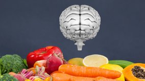 Animation of brain rotating over grey background with vegetables and fruits. mind, thinking and healthy eating concept digitally generated video.
