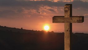 Animation of cross and moving light over landscape at sunset. faith, religion and passing away concept digitally generated video,.