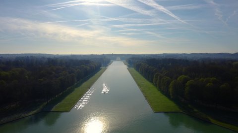 Versailles (Chateau de Versailles), drone aerial view with landscaped gardens, the surrounding area. Lake in the Versailles Park in France. 