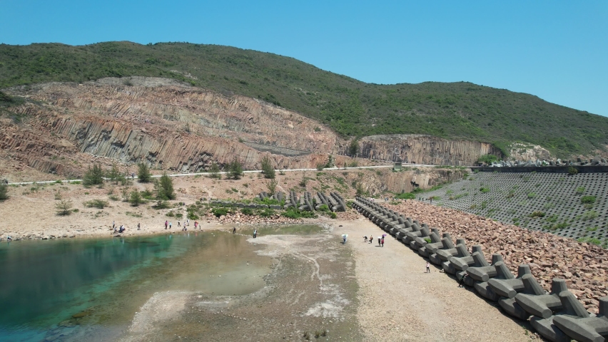High Island Reservoir East Dam in Sai Kung Hong Kong Global Geopark ,is a rare volcanic hexagonal rock columns, beautiful scenery, hiking trails, beaches and islands, geological formations, sea bay