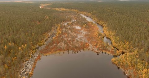 Aerial view of lake Taatsijärvi and backwater of Kurkkiosuvanto in autumn at Kittilä, Lapland, Finland.