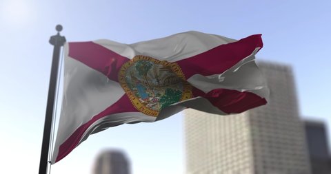 Florida state waving flag on blurry background, USA state news illustration. Blurry background