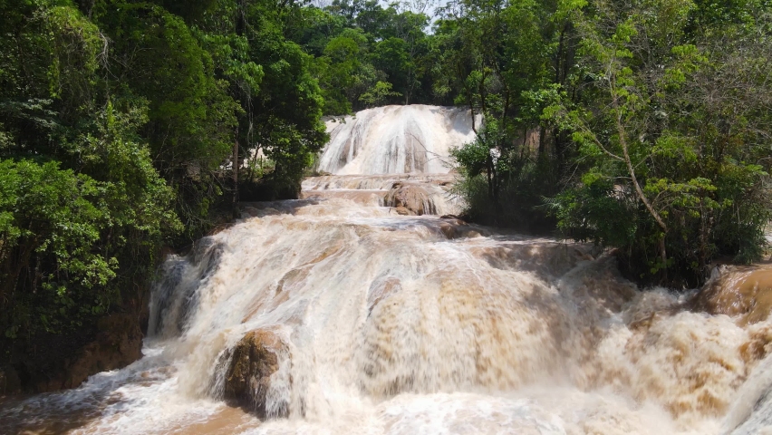 Agua Azul falls in Chiapas, Mexico after heavy rain, aerial 4K view over waterfall