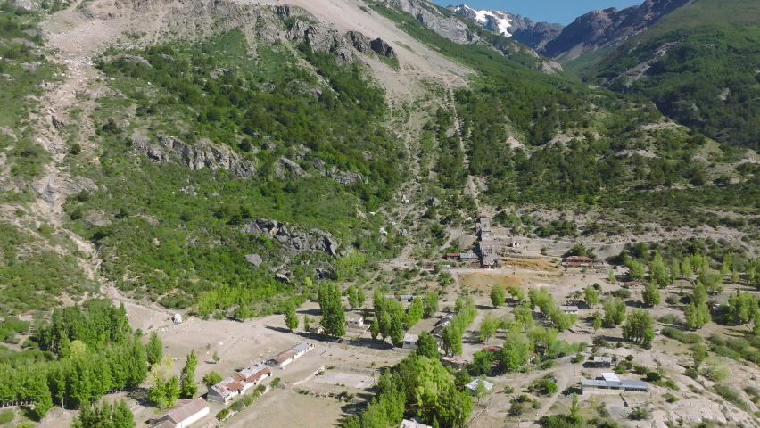 Aerial Flying Over Old Abandoned Puerto Cristal Mining Town On North Shore Of Lake General Carrera. Dolly Back