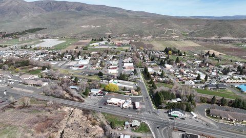 Cinematic 4K aerial drone dolly in shot of downtown and the business district of the town of Naches, in Naches Valley near Yakima, Washington