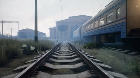 A gloomy post-apocalyptic atmosphere. An abandoned passenger train standing in a railway station. The concept of post-apocalyptic. The animation is perfect for apocalyptic or transport backgrounds.