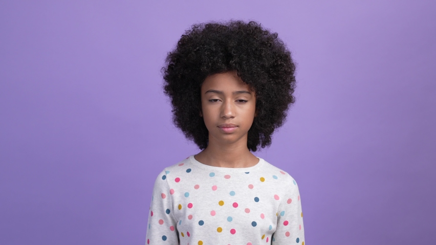 Annoyed kid girl try ignore music sound isolated bright color background