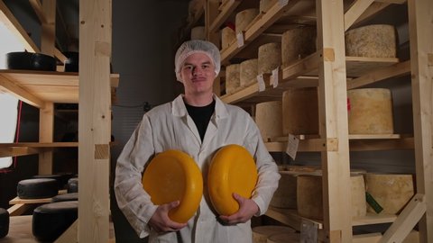 Portrait Of Cheesemaker In Cellar, Basement. Home Cheese Production, Business