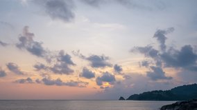 Timelapse sunset nature background. Long exposure with motion blur Seascape over rocky stones in Phuket island Thailand.Footage time lapse Travel asia and website background