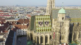Inscription on video. Vienna, Austria. St. Stephen's Cathedral (Germany: Stephansdom). Catholic Cathedral - the national symbol of Austria. Heat burns text, Aerial View