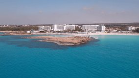 4k drone aerial video of Nissi beach in cyprus, Agia Napa, Mediterranean sea ocean summer background