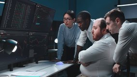 Team of traders working at monitor computer and browsing online in trading office. Multiethnic brokers following rates and bets  - Powered by Shutterstock - Get 15% off with code: PIKWIZARD15