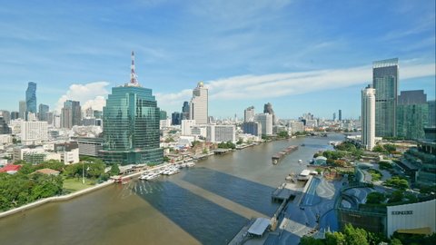 BANGKOK - THAILAND, JULY 2, 2021 :Time lapse skyline of Bangkok city around chaopraya river in Thailand
