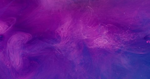 Ink water blend. Color mix. Logo reveal effect. Neon pink purple blue fluid drop motion flash light on bright mist texture abstract background shot on Red Cinema camera 6k.