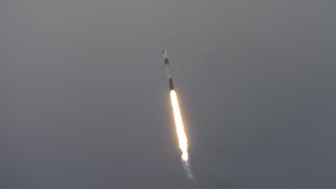 KENNEDY SPACE CENTER, FL- April 8, 2022. A SpaceX Falcon 9 space rocket carrying 4 private Astronauts in a Crew Dragon capsule is launched on Axiom-1 to the International Space Station. 4K.