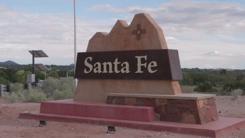This is a video of the welcome to Santa Fe NM Sign with Traffic Driving by in the Distance. Shot on a GH5