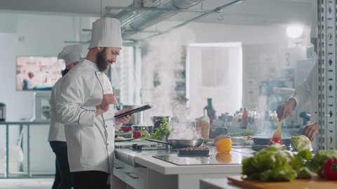 Male Cook Analyzing Culinary Recipe On Stock Footage Video (100% ...