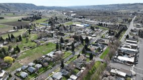 Cinematic 4K aerial drone footage of the business district of the town of Naches, in Naches Valley near Yakima, Washington