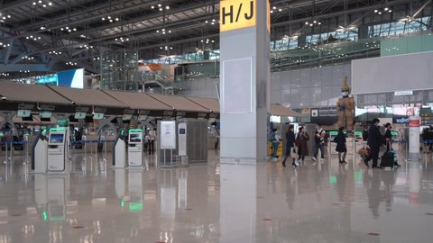 Bangkok , Thailand - 04 11 2022: Passengers In Face Mask Walking Inside The Suvarnabhumi Airport