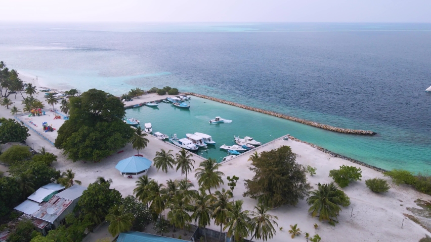 Incredible ocean view with beach, bungalow, road and motorbike. Gorgeous water color.