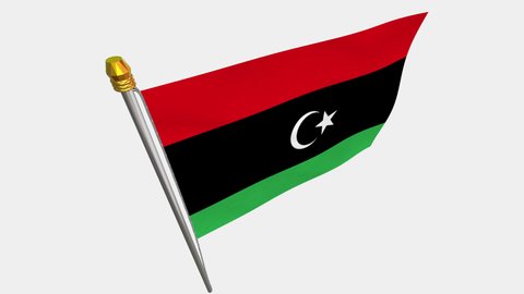A loop video of the Libya flag swaying in the wind from a diagonally upper left perspective.