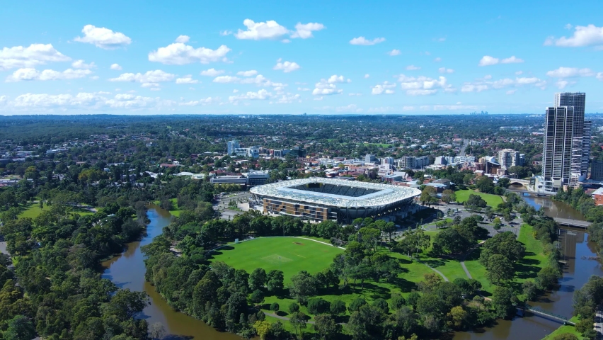 Aerial drone view of Parramatta CBD in Greater Western Sydney, NSW, Australia showing the Stadium, Parramatta River and development of the city as at April 2022  Royalty-Free Stock Footage #1089316113