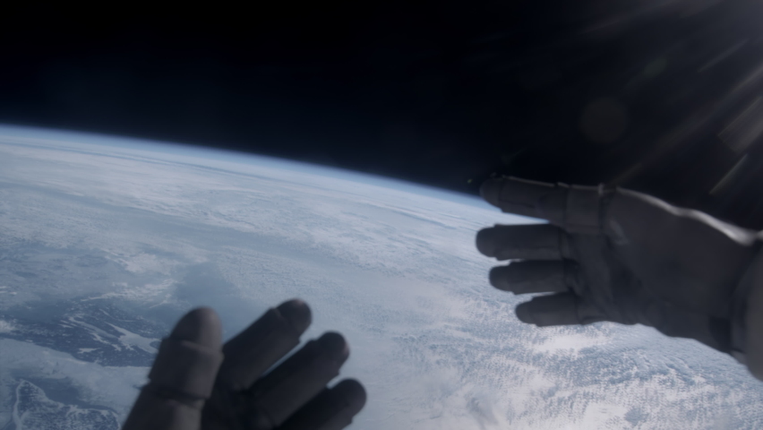POV First person view of Earth through the astronaut helmet during the spacewalk | Shutterstock HD Video #1089316413