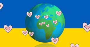 Animation of hearts and globe over flag of ukraine. ukraine crisis and international politics concept digitally generated video.