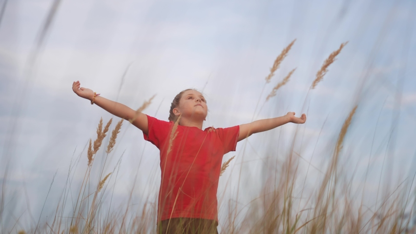 kid pray. pulls hands against a sky. child girl concept faith religion and happy family. kid girl pray hands to the side against sky jew kid lifestyle praying to god. worship and gratitude religion Royalty-Free Stock Footage #1089330801