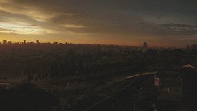 Wide shot of the city during sunset