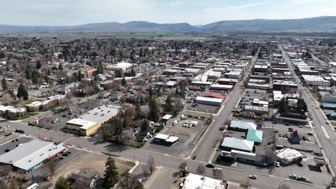Cinematic 4K aerial drone pan shot of the city center of Ellensburg, Kittitas County in Western Washington