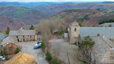 O Cebreiro, historic church in traditional village on way of St. James, Camino de Santiago. Popular sightseeing spot in Spain - drone shot
