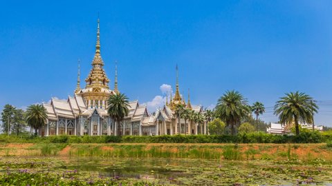 Temple time lapse Non Kum with a lotus pond is considered a symbol of Buddhism. in Sikhio District, Nakhon Ratchasima Province, Thailand