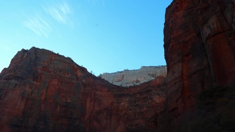 Majestic brown sandstone mountains of Zion National Park, Utah. Driving through them.