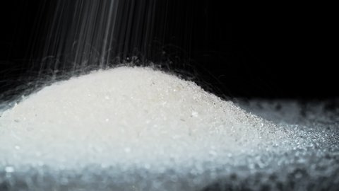 White Granulated Sugar Pours Onto Black Stock Footage Video (100% ...