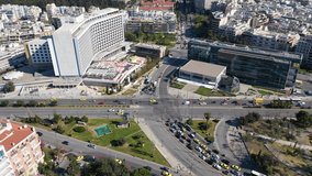 Aerial drone video of famous urban cityscape in Athens centre of Vasilisis Sofias Avenue and Vasileos Konstantinou, Attica, Greece