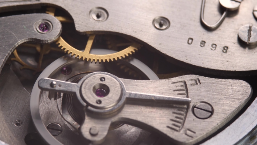 Detail of clockwork with gear. Old clock mechanism works. Successful business or teamwork concept. Watch gears detail